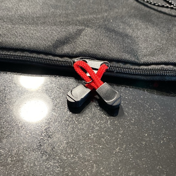 Expandable, sling, backpack, heavy duty area for your headphones to come through - Picture 5 of 7